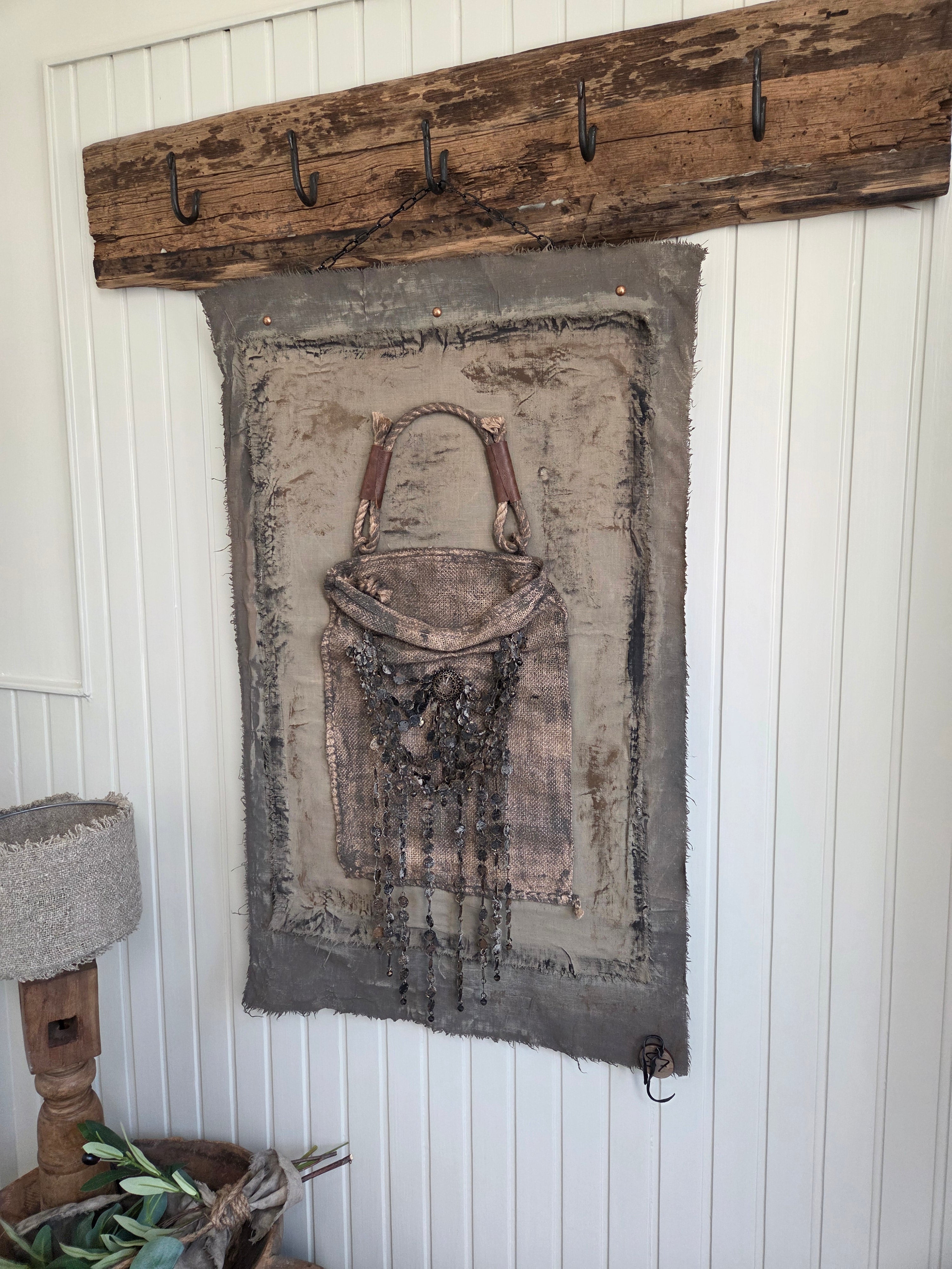 Wanddoek met jute tas