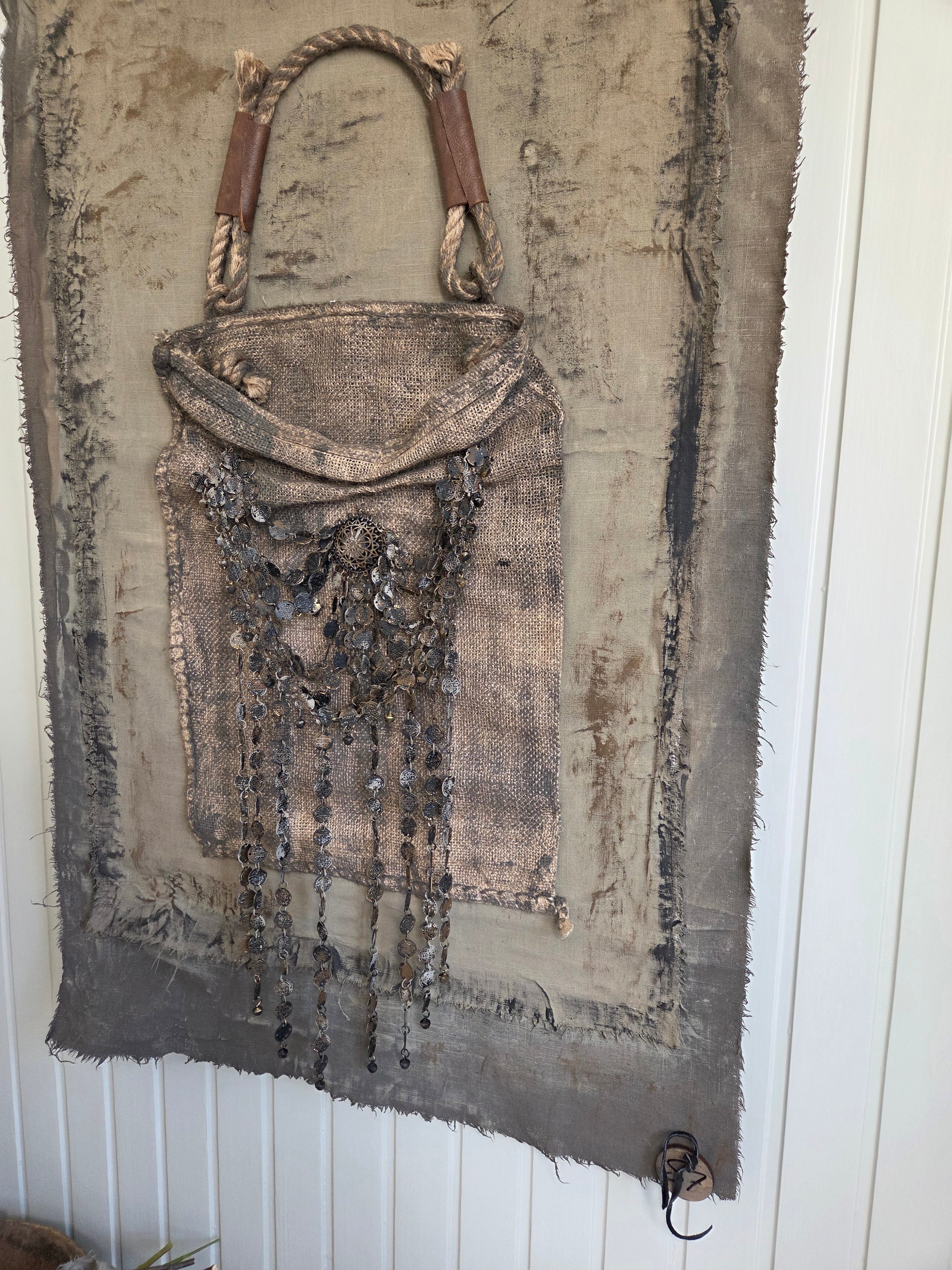 Wanddoek met jute tas
